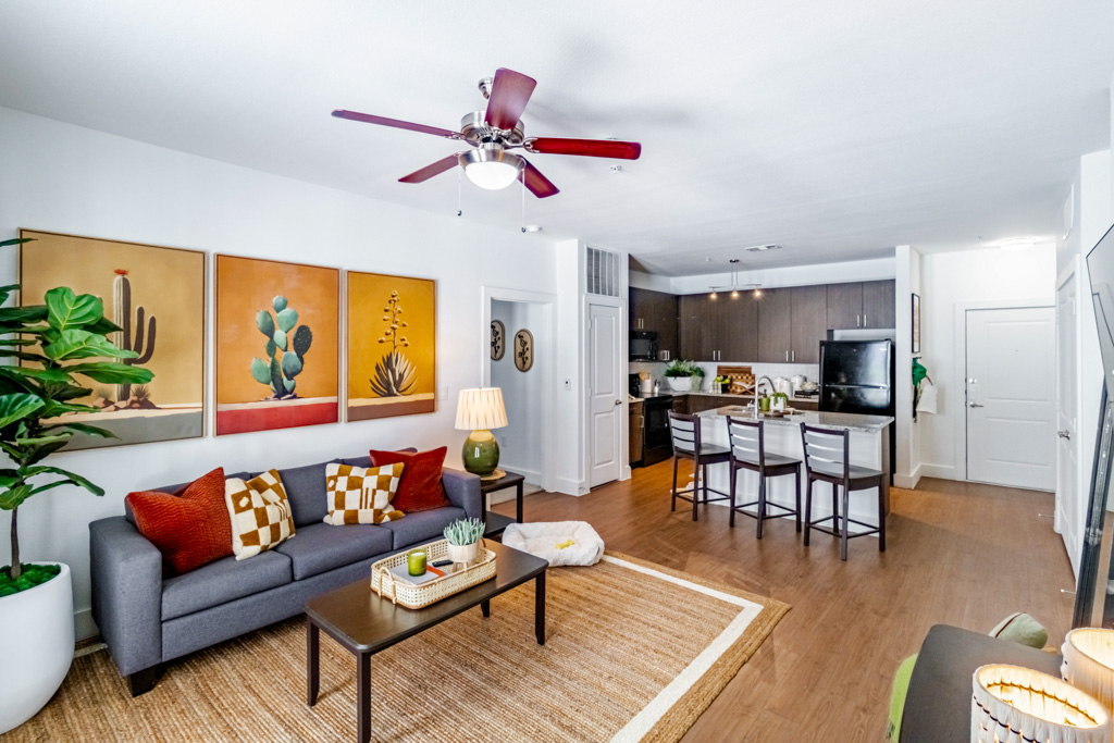 Vibrant living room with modern furniturea and wood flooring.